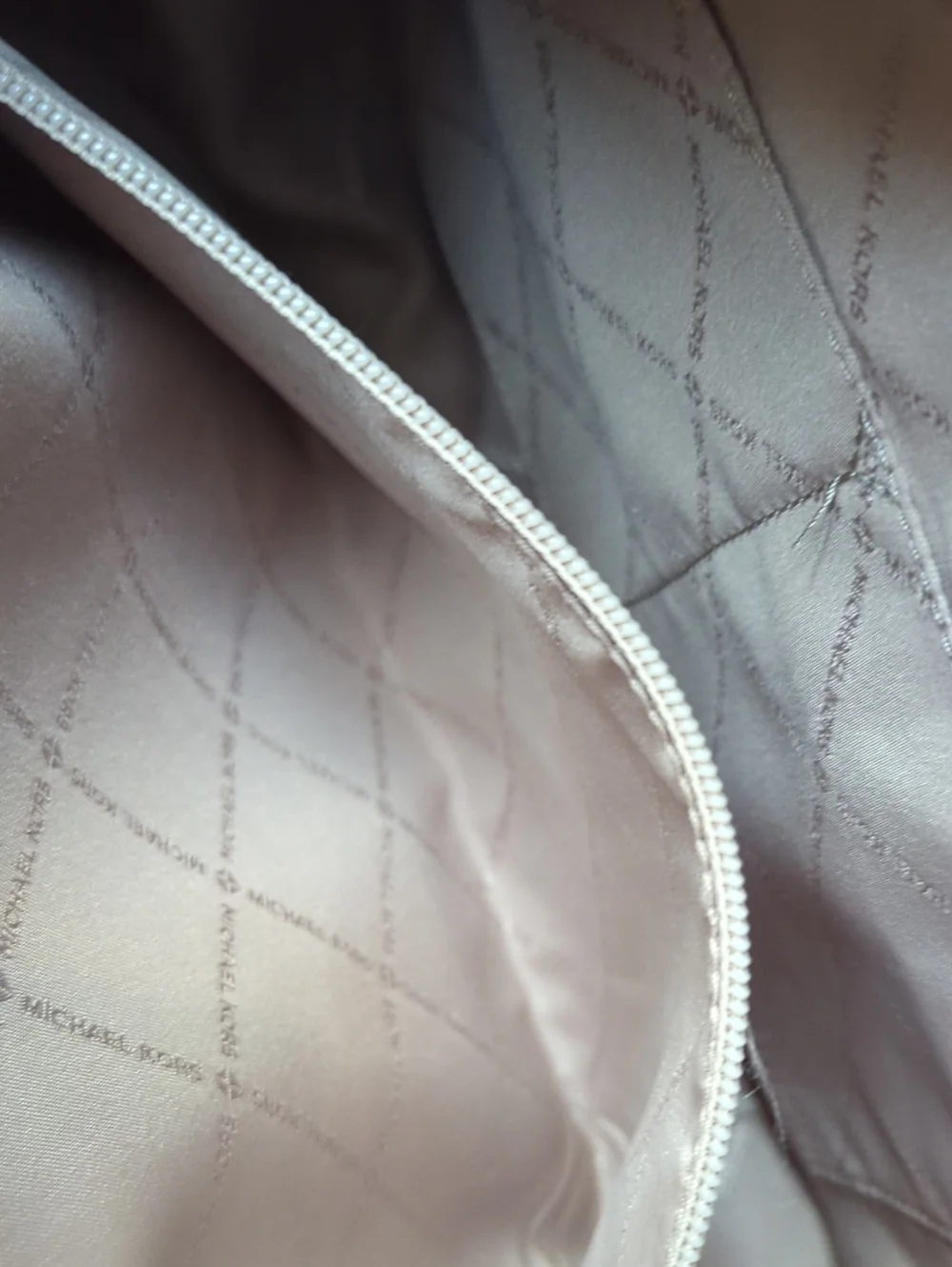 Michael Kors used inside